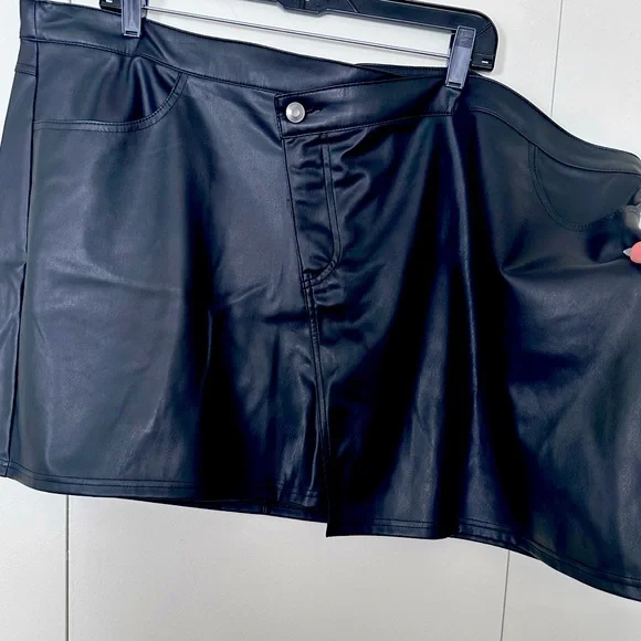 Black, faux leather mini. - Picture 1 of 4